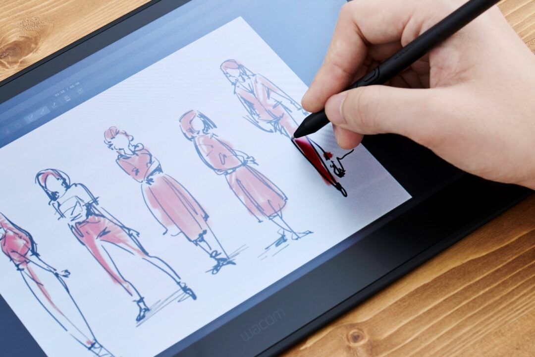 Person sketching on a tablet